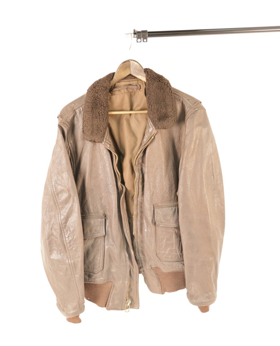 Two US Navy Vintage WWII Era Leather Aviator Jacket USN: Step back in time with this authentic vintage US Navy WWII era leather aviator jacket, a testament to the rugged style and enduring quality of military apparel. This jacket boasts a worn-in, distresse