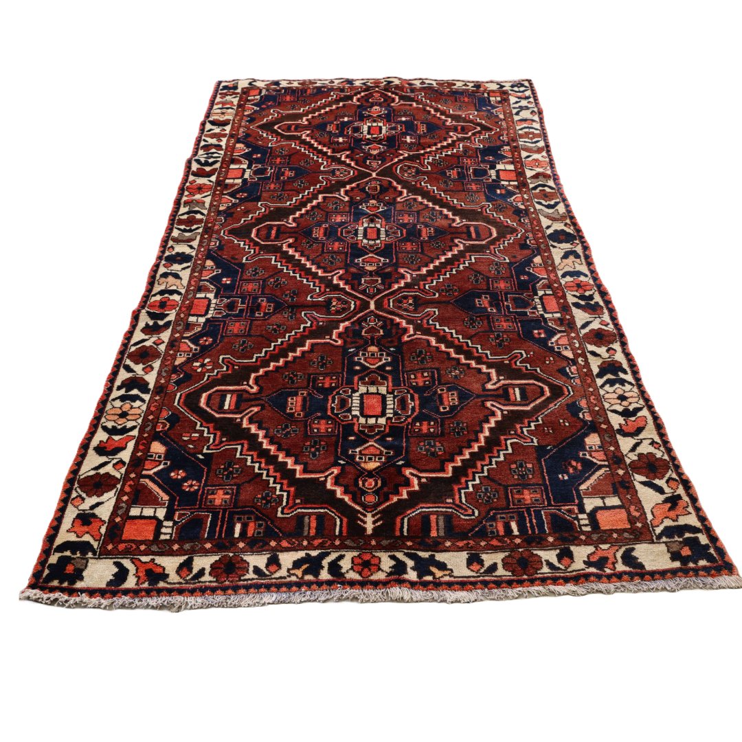 5.4ft x 10ft Vintage Hand made Persian Rug 100% wool Bakhtyar city: Vintage Hand made Persian Rug 100% wool Bakhtyar city A vintage, handmade Persian rug crafted from 100% wool in the Bakhtyar city style is a remarkable piece of traditional craftsmanship. Persian rugs