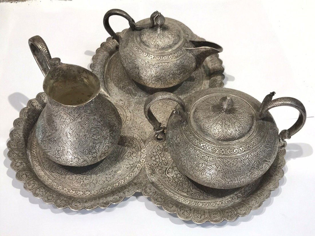 Set of 4 Antique Silver Plate Tea And coffee Set ,2311 grams: Vintage antique Set of four (4) carved silver plate tea and coffee set ,Tray ,sugar bowl,tea (coffee ) pot.milk jug cremer.All 4 weights 2311 grams or 81.518 OZAll 4 has vintage condition,maybe needs