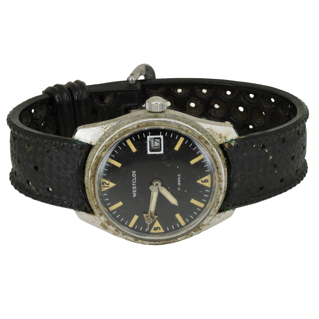 Vintage Westclox Mechanical Watch with Unique Perforated Leather Band: This vintage Westclox mechanical watch is a striking example of mid-century design and rugged functionality. Known for its durable and practical watches, Westclox has created a timepiece that is perfe