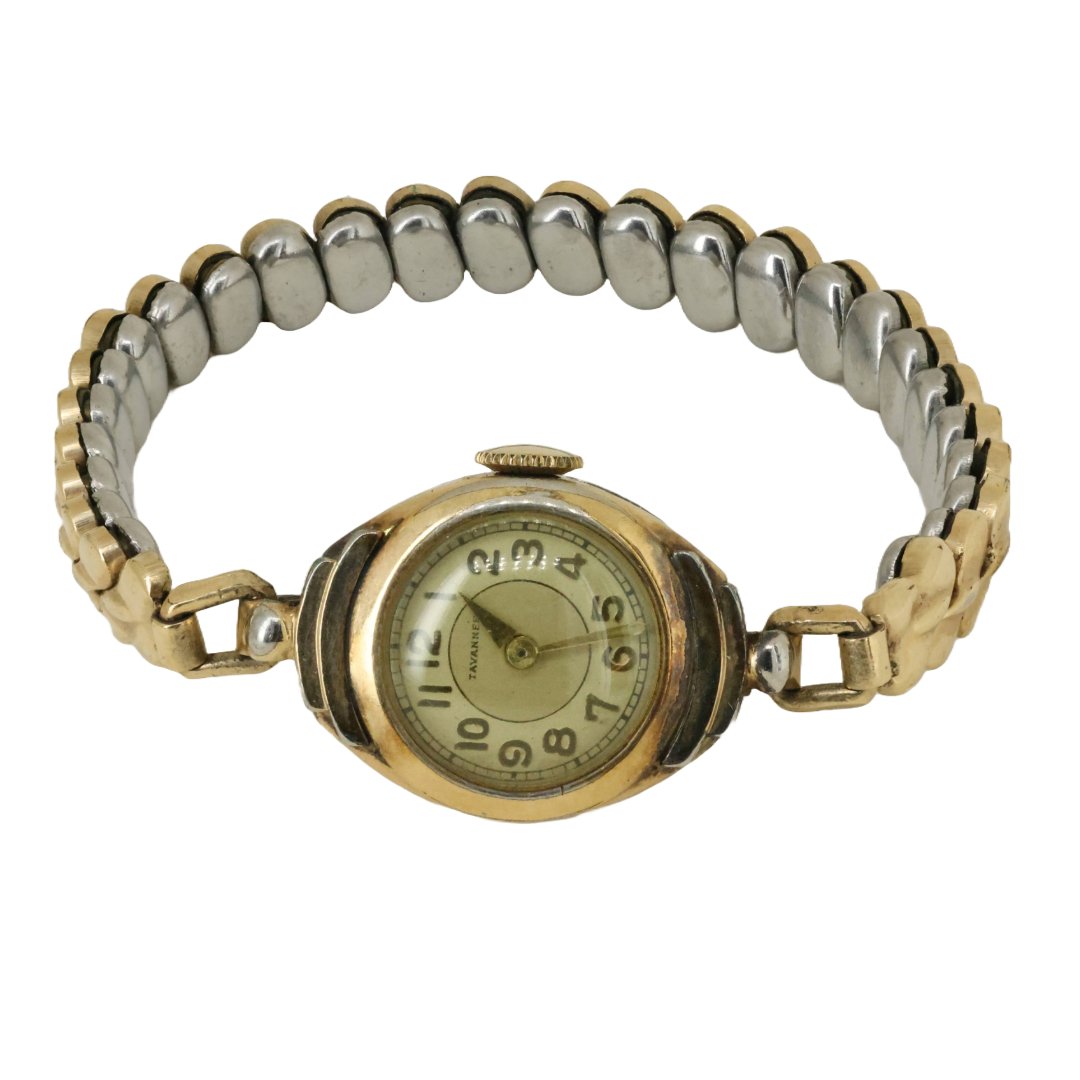Charming Vintage Tavan Ladies' Watch with Two-Tone Expansion Bracelet: Delve into the elegance of the past with this exquisite vintage Tavan ladies' watch, featuring a distinctive two-tone expansion bracelet that highlights its mid-century design appeal. This piece is a 