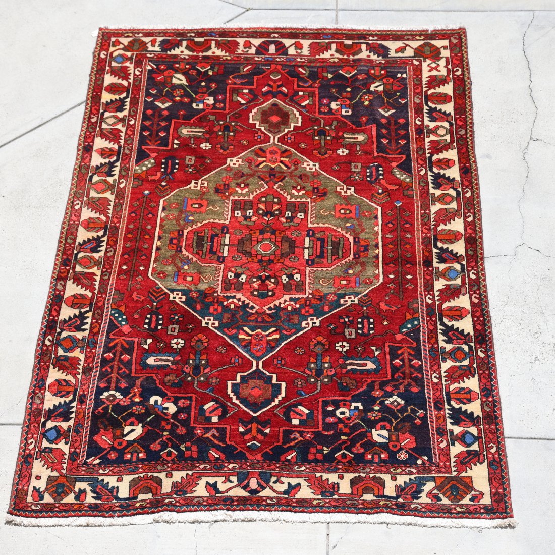 Vintage Antique Persian Rug Bakhtiar - 6.8*10.2 FT: This antique Persian rug is a true collector's item, perfect for adding a touch of elegance and history to any home. The intricate patterns and vibrant colors are a testament to the skilled artisans w