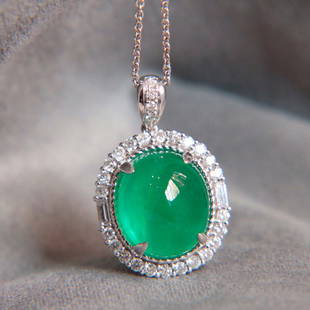 14K White Gold 5.62 CTW Natural Emerald & Diamond Pendant with Certificate: Ref:1128004 Gold Content:14K White Gold For people:Women Main Gemstone: Emerald Number of Gemstone:1 Shape:Oval Carat Weight:5.27ct Color:Vivid Green Cut Grade:G Adjacent Gemstone 2 : Diamond