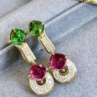 14K GOLD 6.38 CTW NATURAL TOURMALINE & DIAMOND EARRINGS: Ref:708009Gold Content:14K GoldMain Gemstone:TourmalineNumber of stones:4Shape:Suger-LoafCarat Weight:5.9ct Color:ColorTreatment:NaturalCut Grade:GAdjacent Gemstone 2 : DiamondShape:RoundCarat