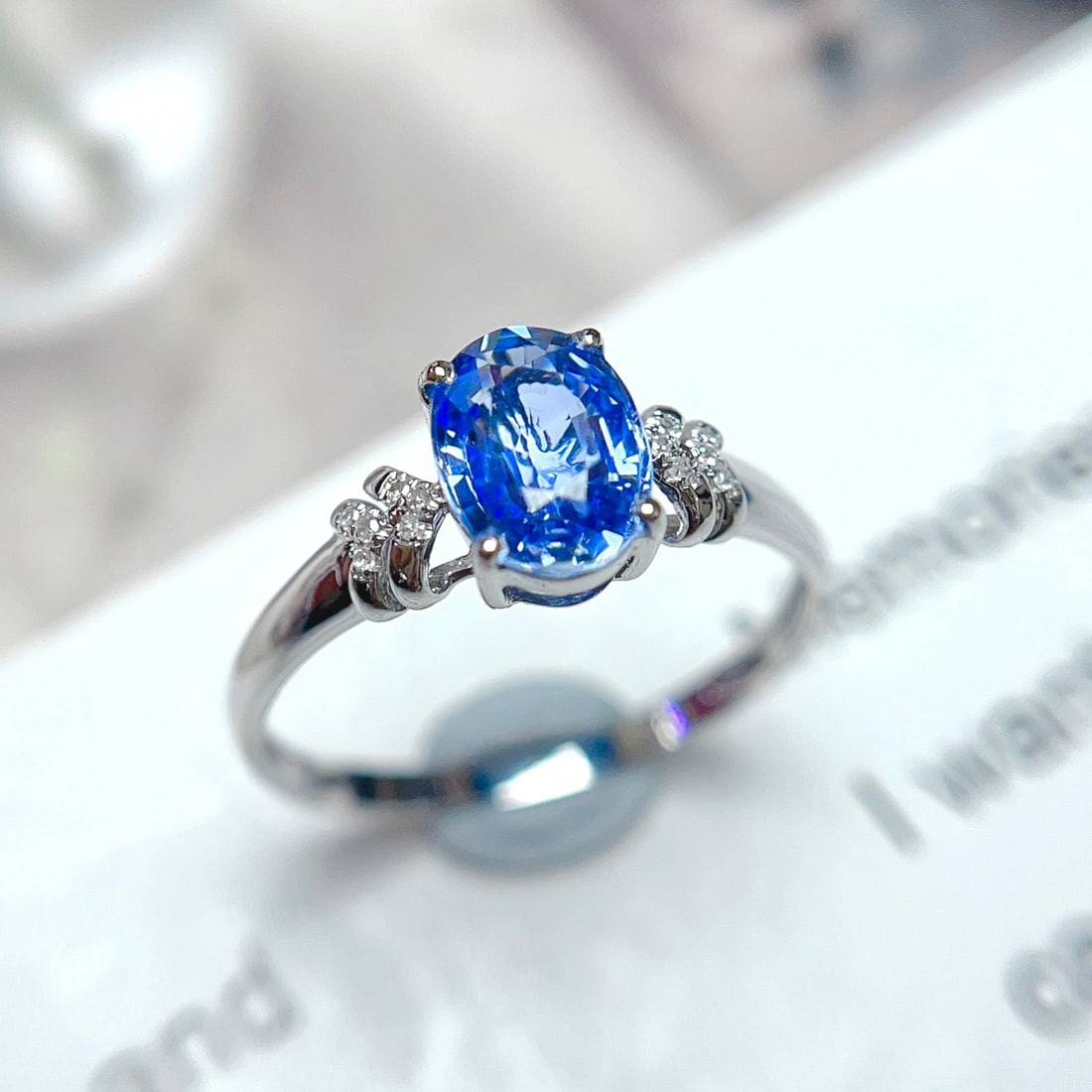 CERTIFIED 14K GOLD 1.65 CT NATURAL SAPPHIRE & DIAMOND RING: Ref:625167 Gold Content:14K Gold Ring Size:7.25US(We can resize for free) Main Gemstone:Sapphire Number of stones:1 Shape:Oval Carat Weight:1.65ct Color:Blue Treatment:Natural Cut Grade:G Adja