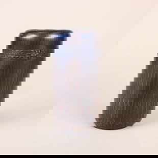 Roycroft Tooled Copper Cylinder Vase: Roycroft hammered copper cylinder vase with tooled stylized flowers. Marked with small early impressed orb and cross. East Aurora, NY. Circa 1920. 5" x 2.5". This lot ships from our Pennsylvania