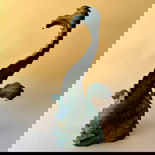 ET Hurley Bronze Doorstop: E.T. Hurley bronze doorstop, Cincinnati OH dated 1925. A large cast bronze doorstop, body of a mythical dolphin flanked by two jumping dolphins. Original dark green patina, signed ETH on lower