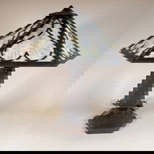 Limbert Hammered Copper Table Lamp c1910: 6 Sided Limbert arts and crafts hammered copper lamp. Original glass, new patina and a small filled hole in base. 22" tall, 20" shade. Rewired. This item will ship from our Michigan location.