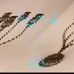 Tiffany Studios 4-Arm Candleabra: Tiffany Studios blown-out green glass and bronze four-arm candelabra. New York, NY. Marked under base with impressed "S1040" only. 13" x 9.5". This lot ships from our Pennsylvania location.