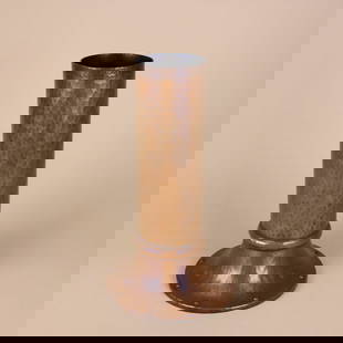 Roycroft Hammered Copper Tall Cylinder Vase: Roycroft hammered copper tall cylinder shaft vase with flaring riveted base. Early variation with hand tooled rim. Design attributed to Victor Toothaker. Original caramel brown patina with one small