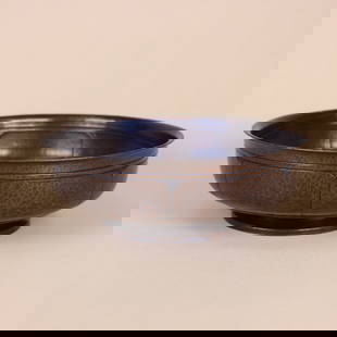 Roycroft Copper Centerpiece Bowl: Roycroft large hammered copper centerpiece, or fruit bowl with hand tooled details, flared lip and weighted foot. Signed with large early orb and cross mark. East Aurora, NY. Circa 1910s. 9” x