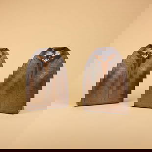 Roycroft Hammered Copper Bookends: Pair, Roycroft hammered copper bookends with elongated repousse trefoil, or trillium flower design. Excellent original golden brown patina. Each marked with large early impressed orb and cross. Circa