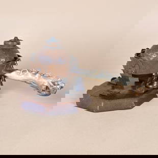 Joseph Heinrichs Cigar Lighter: Joseph Heinrichs gimbal cigar lighter, New York circa 1904. A large Arts & Crafts hammered copper lighter, mounted on an original wood base, silver rivets throughout. Handle made of antler bone,