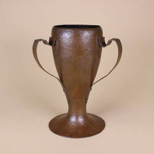Stickley Bros. 3-Handled Copper Vase: Stickley Brothers arts and crafts hammered copper vase with three riveted handles and dovetailed seam to body. Variant of form #246. Original patina. Unmarked. Grand Rapids, MI. Circa 1910. 9.5" x 7"
