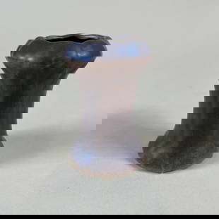 Hampshire Art Pottery Vase: Small signed Hampshire art pottery vase. Hairline starting at rim, down one side. 3" x 2". This item will ship from our Michigan location.