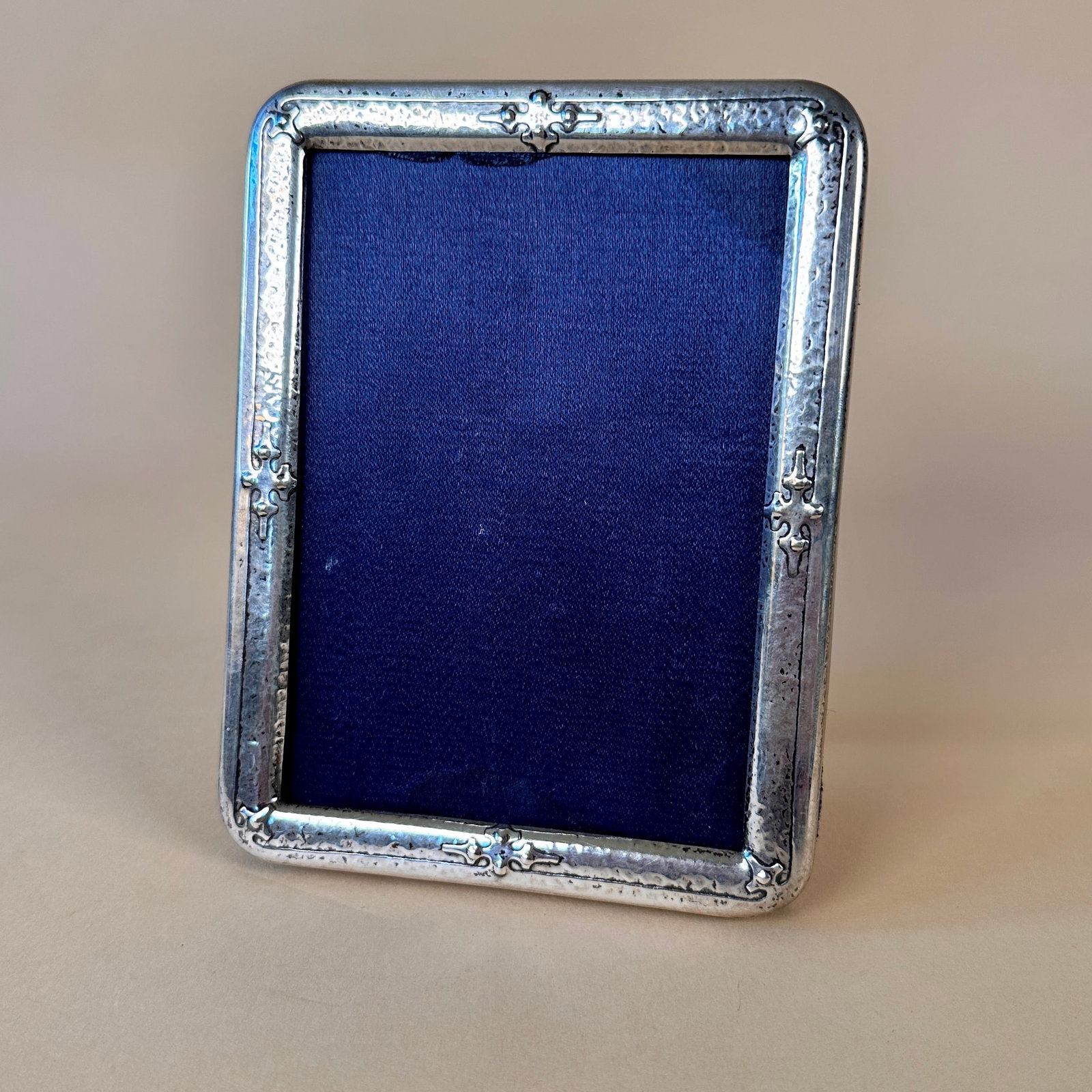 Shreve & Co. 14th Century Silver Frame: Shreve & Co. sterling silver 14th Century frame, San Fransisco circa 1912. A hammered silver frame with the 14th Century gothic decoration. Signed and numbered, original blue velvet interior and easel