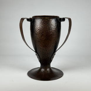 Stickley Brothers Hammered Copper Vase, No. 246: Stickley Brothers arts and crafts hammered copper vase with three riveted handles and dovetailed seam to body. Marked under base with impressed model number "246". Grand Rapids, Michigan. Circa 1906.