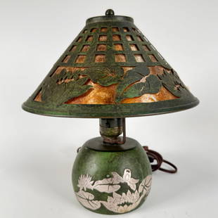 Heintz Sterling On Bronze Lamp: Excellent Signed Heintz boudoir lamp with mica shade. Unsigned, missing felt bottom. Measures 10"x9" This lot will ship from our Michigan location