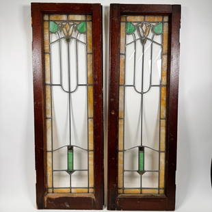 Pair Arts And Crafts Leaded Glass Windows: Nice matching pair of leaded windows in an arts and crafts motif. Measures 44 1/2"x15" This lot will ship from our Michigan location.