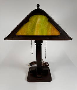 Bradley And Hubbard Arts And Crafts Table Lamp: Strong arts and crafts design to this table lamp by Bradley and Hubbard. New art glass, and new patina. Rewired. Measures 18"x12" This lot ships from our Michigan location.