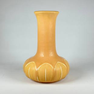 Hampshire Pottery Vase: Hampshire Pottery, arts and crafts tall vase with two-tone matte yellow glaze over molded leaves. Marked under base with impressed “Hampshire Pottery", raised model number "124" and "Emoretta" mark.