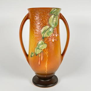 Roseville Art Pottery Fuchsia Vase: C1938, signed Roseville Fuchsia line tall vase. Measures 12"x8 1/2"This lot will ship from our Michigan location.