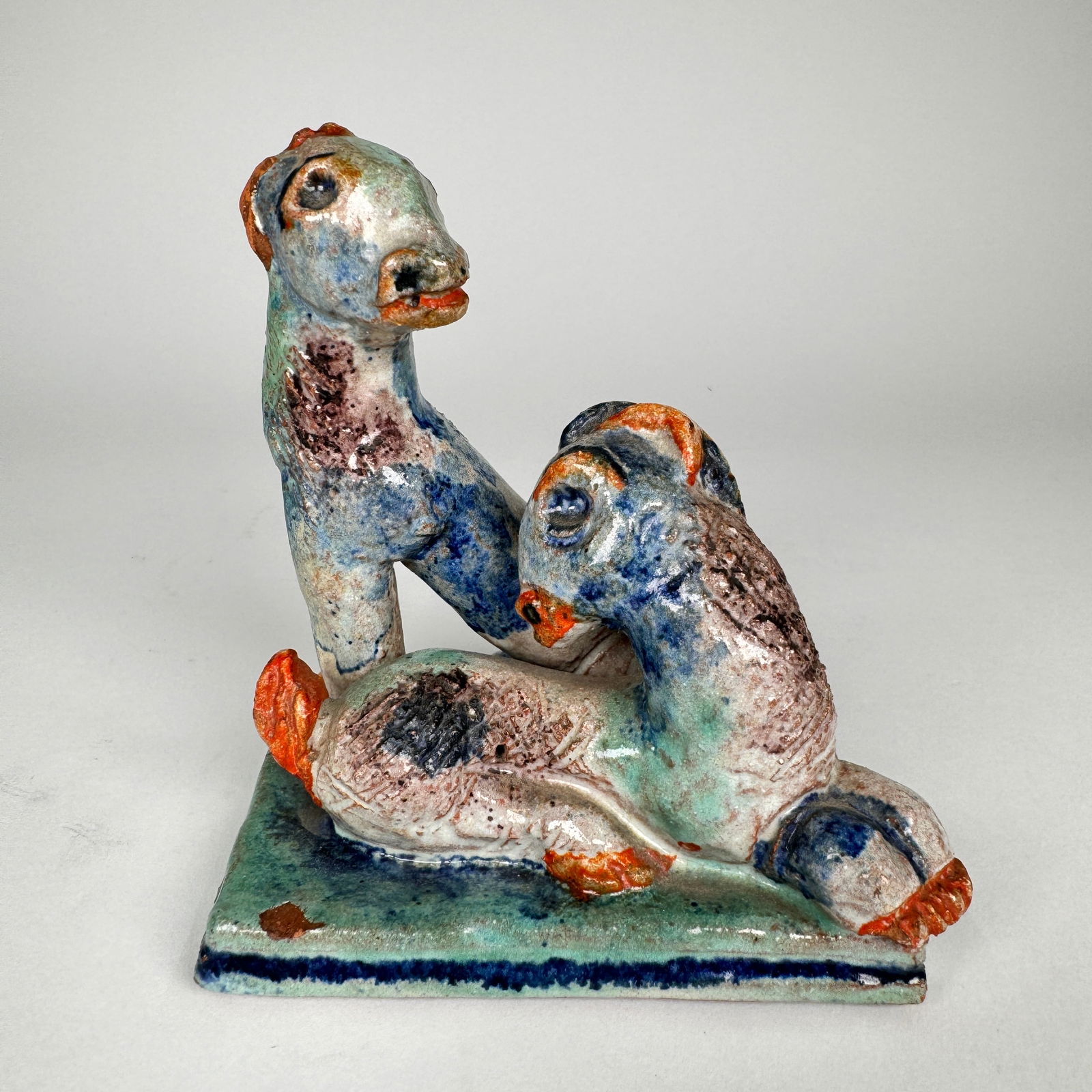 Gudrun Baudisch Wiener Werkstätte Austria, c. 1927 Lambs: Glazed terracotta Impressed manufacturer's mark and artist's initials to underside ‘5 WW Made in Austria 329 GB’. Measures approx 5" tall This lot ships from our Michigan location.