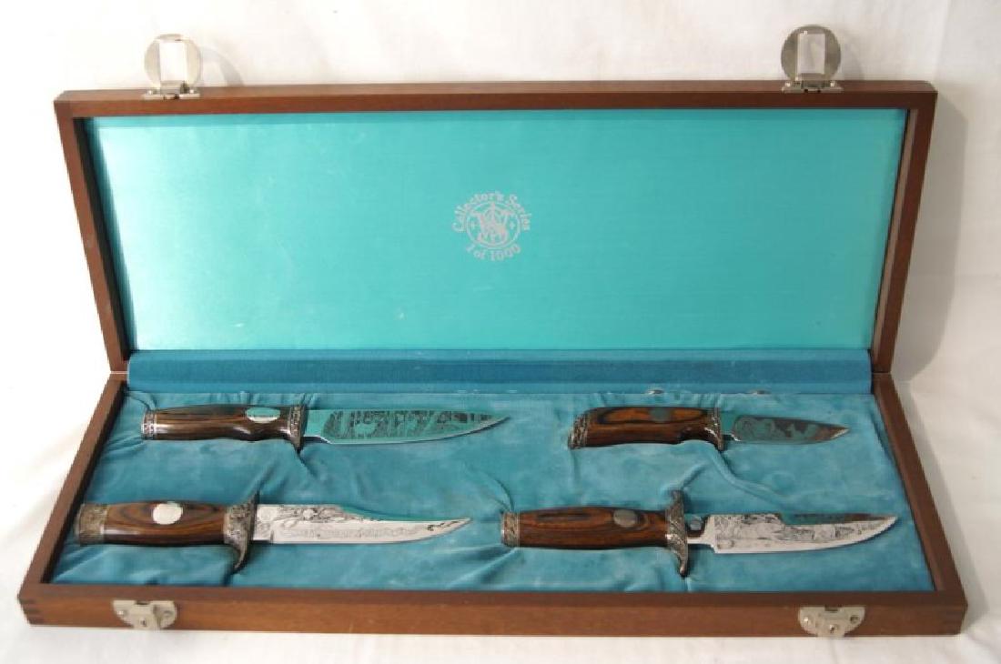 Smith & Wesson Collectors Series Knives, cased: Smith & Wesson Limited Edition knife set with matching serial numbers (0538) include Collectors' Series 5 1/2" blade with grizzly bear scene. 2) Collectors' Series 5 5/8" blade with stag scene. 3) Col