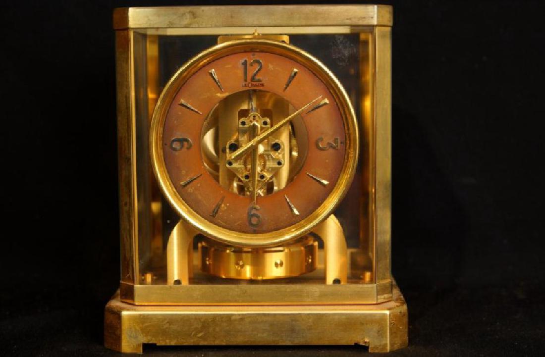 Jaeger-LeCoultre Atmos clock: A 15 jewel Atmos clock made in Switzerland. Open escapement, in working condition. Measures 9.25" by 8.5" by 6.5".
