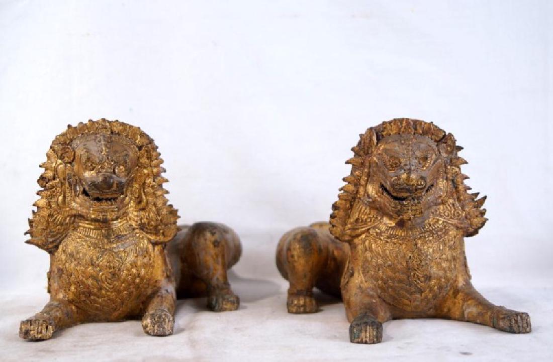 Pair of Antique Bronze Thai Foo Dog Censers: Show age, Sandcast, alternate side matching shrine guardians. Measure approx 12" by 7.5" tall by 6.5" wide.