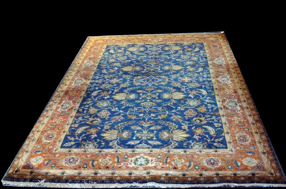 Antique Agra rug with French blue ground: Measures 7' x 10'. Approx 70 to 80 years old. All over pattern small palmettes and serrated leaves with turtle border.