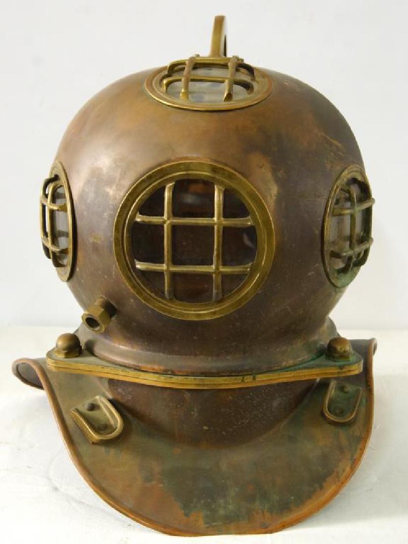 Copper & Brass Nautical Diving Bell: four glass windows with bars, two brass plates locked together join the helmet to the shoulder mount. Looks like an old construction with a brass handle that shows newer screws, the air stem shows old