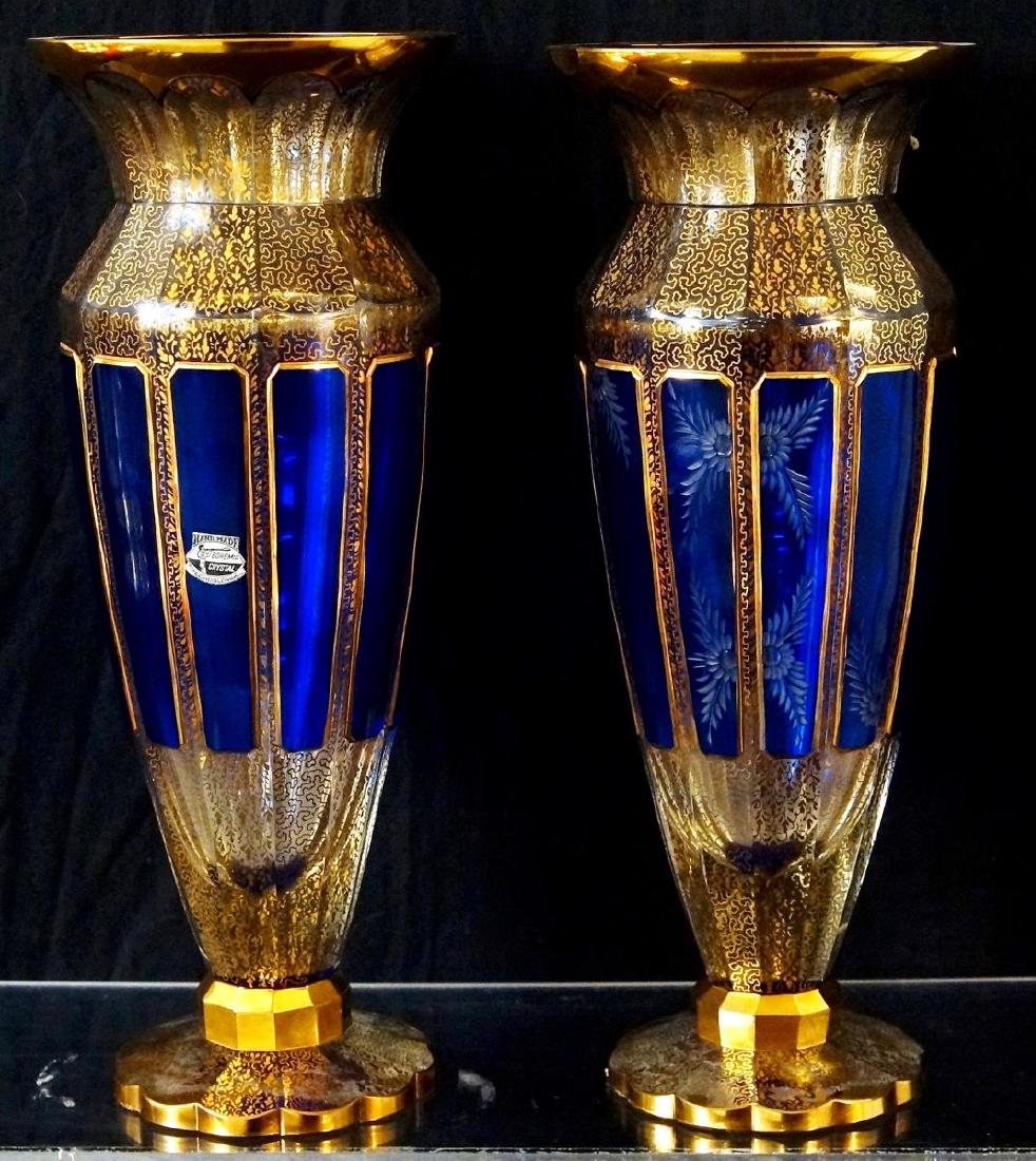 Pair Bohemia Crystal Glass Cobalt & Gold Vases: 14.6" H both are handmade, hand painted gilt accents with etched cobalt glass panels
