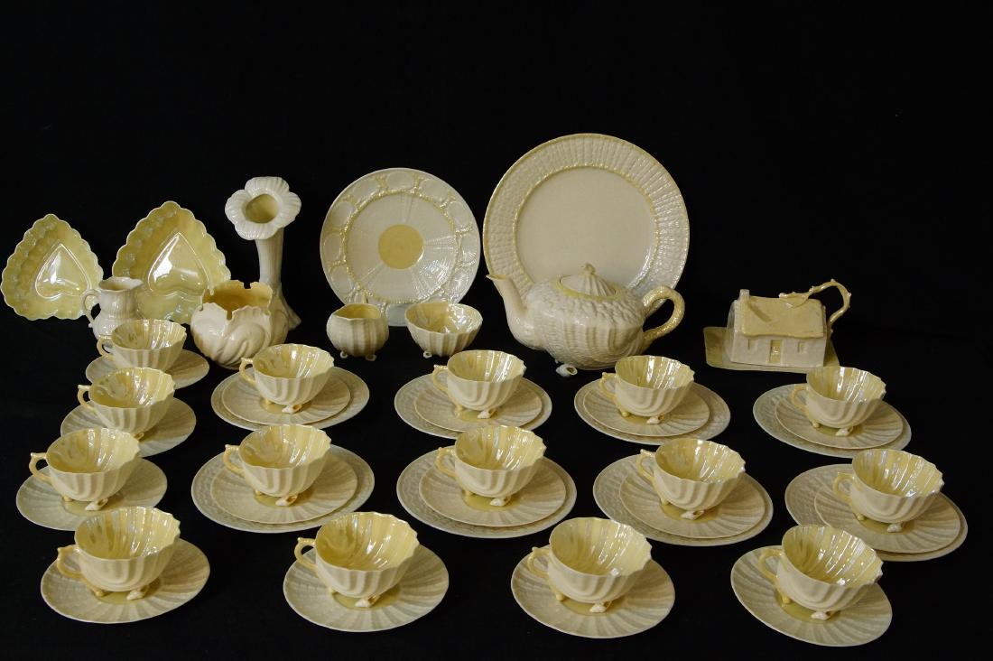 Fine Belleek luncheon set - green mark: unusual sea shell pattern with gold finish on the egg white translucent porcelain, includes a fine tea pot, cups and saucers, plates and a very rare butter dish - app 49 + pcs