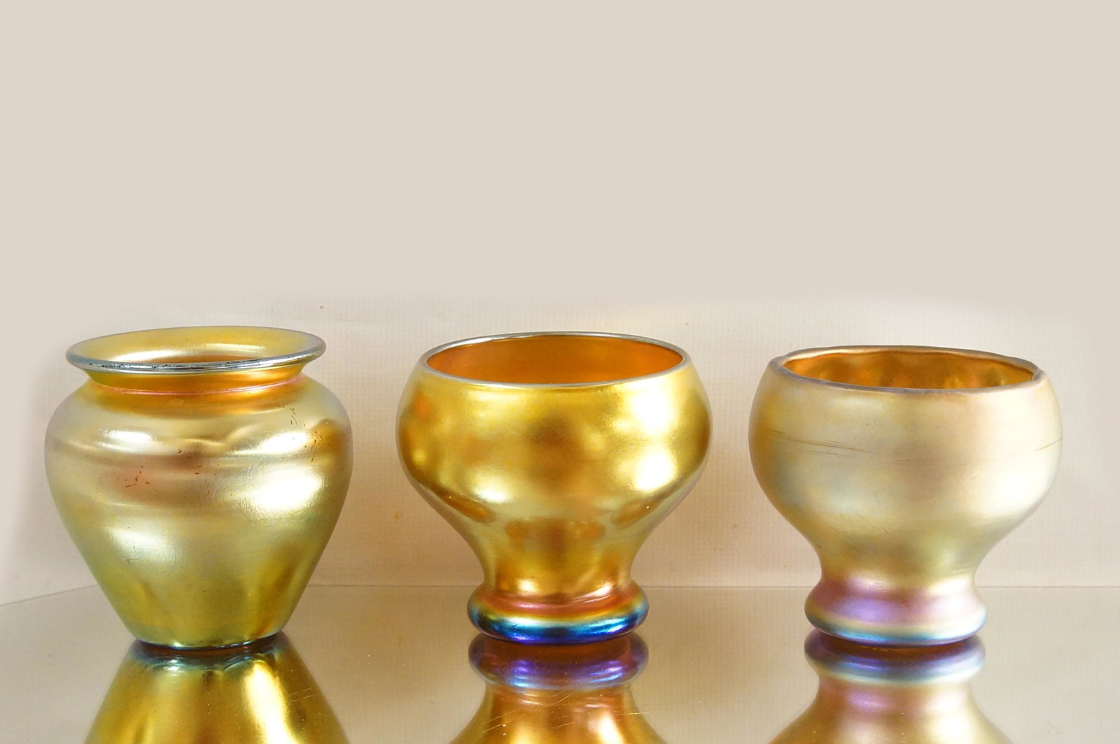 Steuben Aurene miniature Iridized art glass vases: A Steuben Aurene Amphora Vase and two miniature cups three total pieces