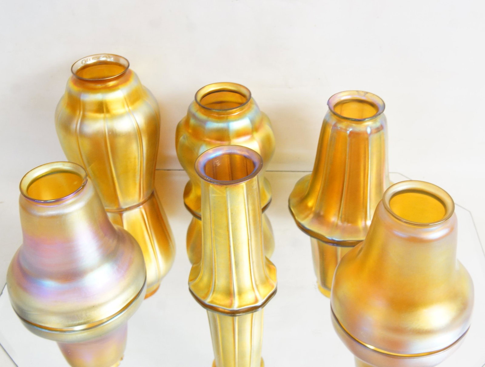 Quezal and Steuben Iridized glass lamp shades 8: gold iridescent shades, one pair matching plus four addition shades with horizontal pulled lines - 6 pcs