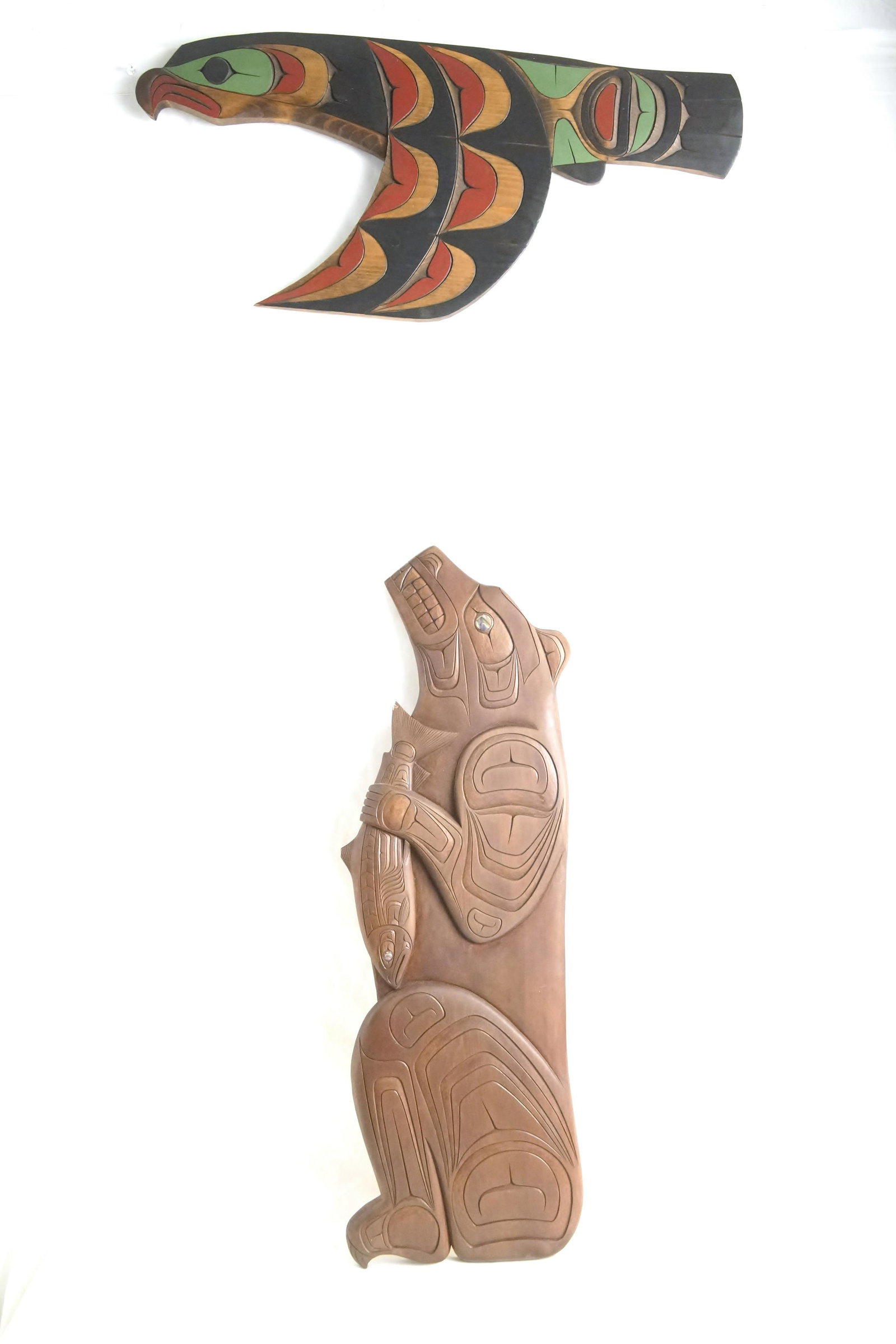 2 Northwest Coast First Nations carvings: Bear and Salmon measures 29" x 9.5" by Craig Voisin w abalone eyes plus Les Harper eagle 25"x11"