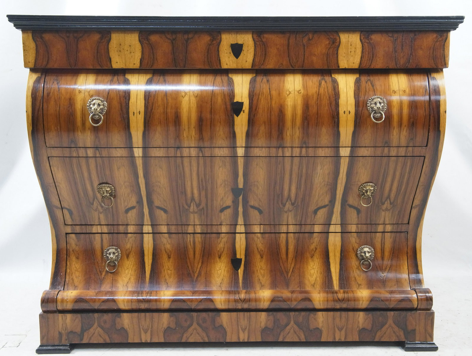 Biedermeier Commode after Josef Danhauser, Austria: Biedermeier Commode after Josef Danhauser, Austria c. 1825, Curved front, AAAA+ Grade Exotic Burl veneer book matched on all three sides. The Burl creates a number of esoteric images including a doubl