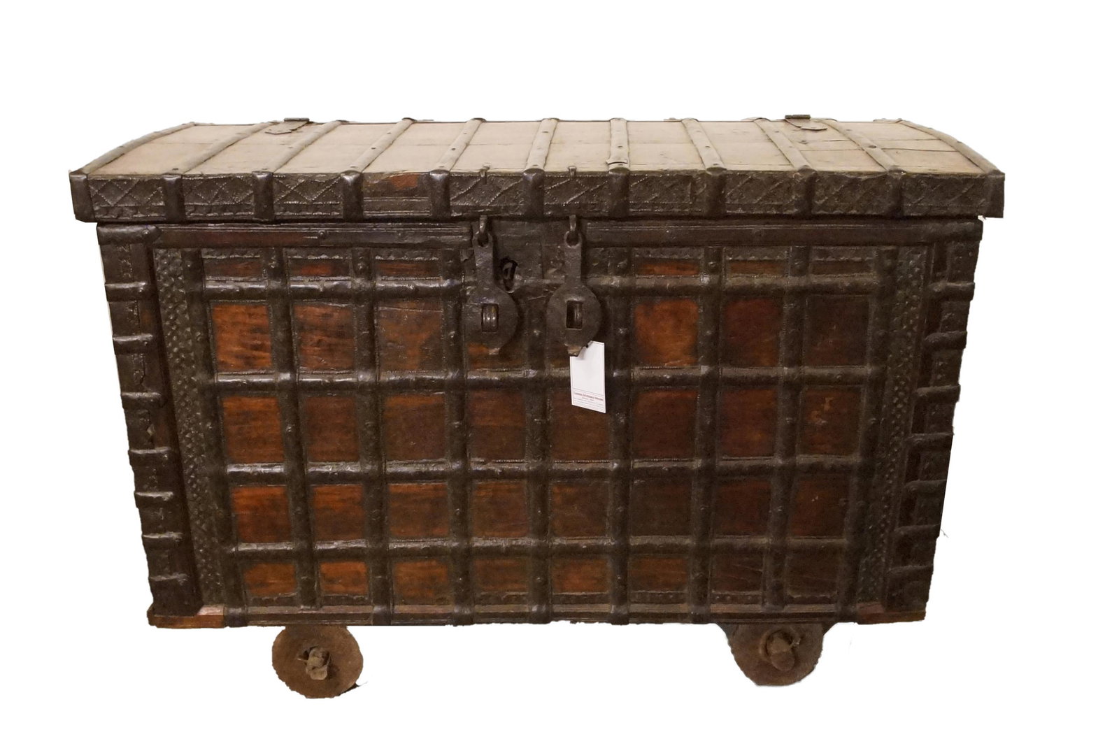 Antique Spanish Wood and Iron chest with wheels: original embossed iron hardware, square straps throughout with embossed end pieces and top. Iron double hasp and lock, curved top, iron handles ca. early 1800's - possible treasure strong box - possib