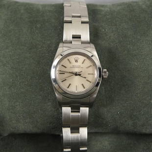 Ladies Rolex Oyster Perpetual Chronometer: THE OYSTER PERPETUAL 28 WITH A PINK DIAL AND AN OYSTER BRACELET. 'The aesthetics of the Oyster Perpetual models set them apart as symbols of universal and classic style. They embody timeless form and