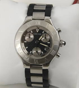 Cartier 21 Chronoscaph Women's Watch 38MM CASE: Calibre 471 Battery Powered Quartz Movement Black Rubber and Stainless Steel Band with a Hidden Folding Buckle clasp Water Resistant 100 Meters / 330 Feet includes original box and cartier literature