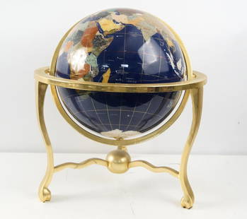 Inlaid lapis world globe on brass stand: Inlaid mother of pearl and other semi-precious stones with lapis as the water, and a brass finished stand
