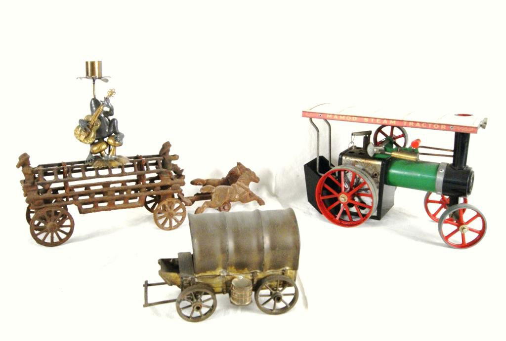 Steam engine, cast iron toy covered wagon: collectibles - From the estate of actor John Crawford Thousand Oaks, Calif.