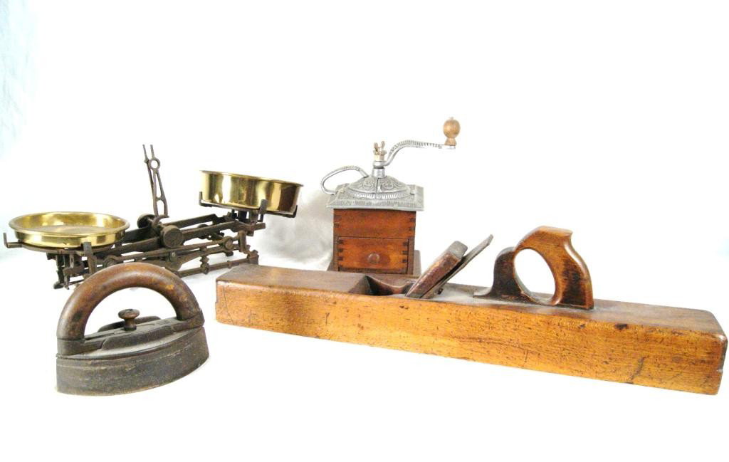 Coffee mill, scales, wood plane, sad iron: collectibles From the estate of actor John Crawford Thousand Oaks, Calif.