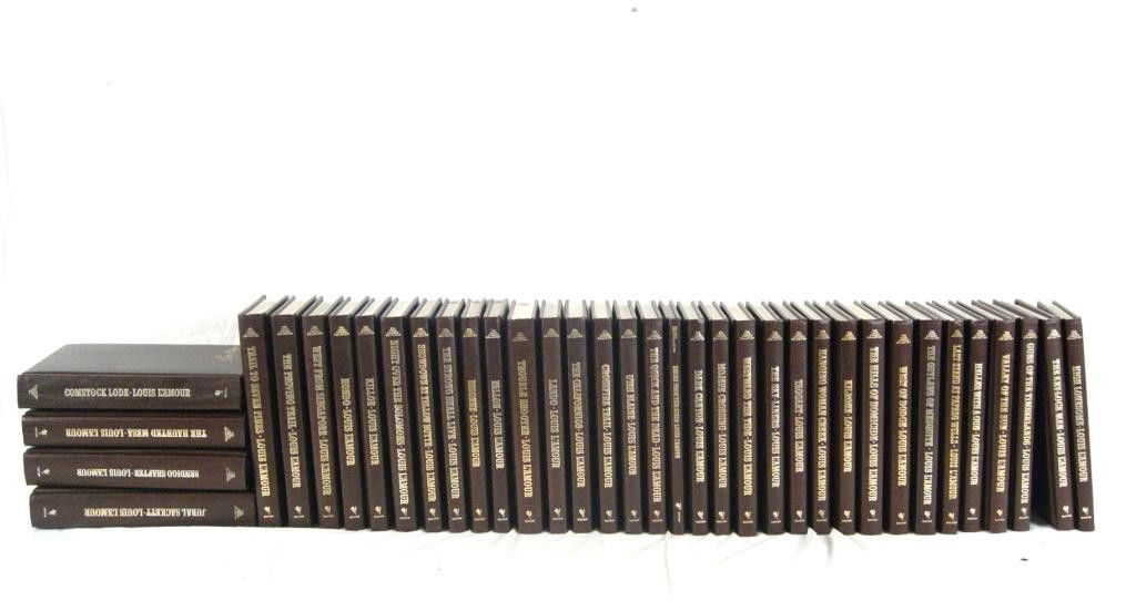 Collection of 33 Leather bound Louis L"Amour books: Louis L' Amour Hardcover Collection June 1981. From the estate of actor John Crawford Thousand Oaks, Calif.