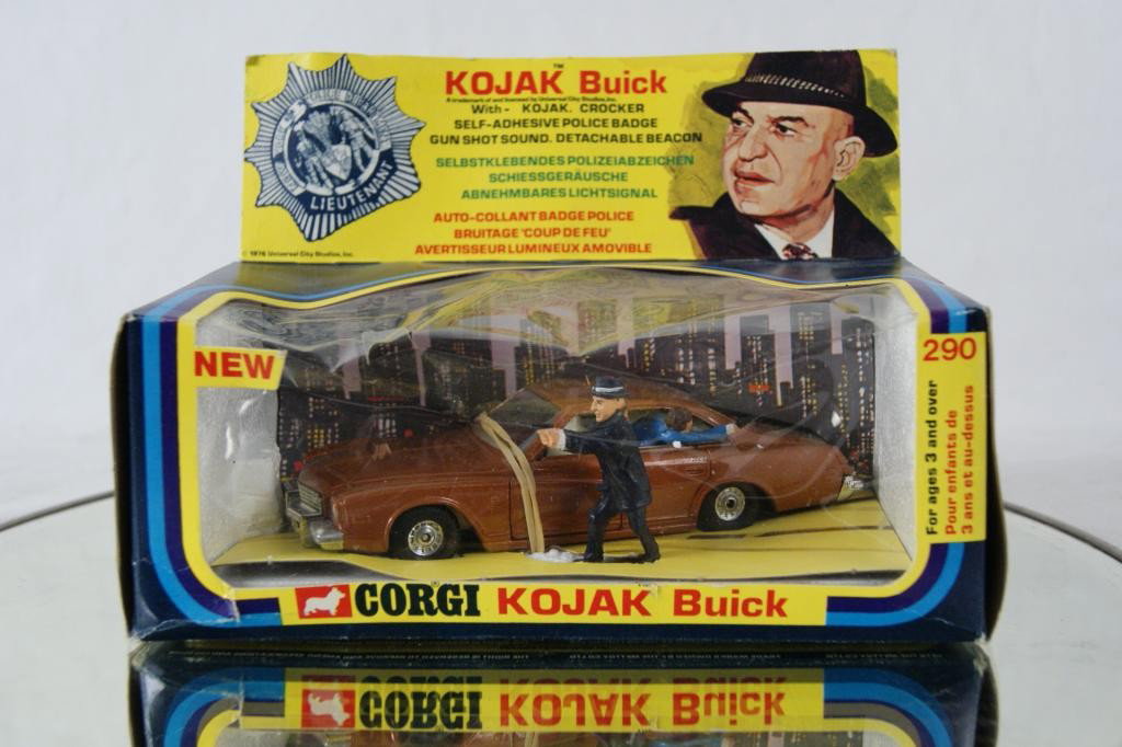 Corgi Kojak Buick in the original box 1976: Corgi Kojak Buick in the original box . The toy appears to never have been played with NIB. Kojak and his partner are present, siren is intact; The toy is near mint, the box is a 6.5/10 and the plasti
