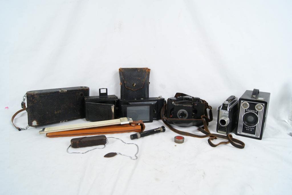 Collection of 7 Vintage cameras and slide rule: and monoscope. Brownie target six - 16 Cine Kodak film cam bellows more