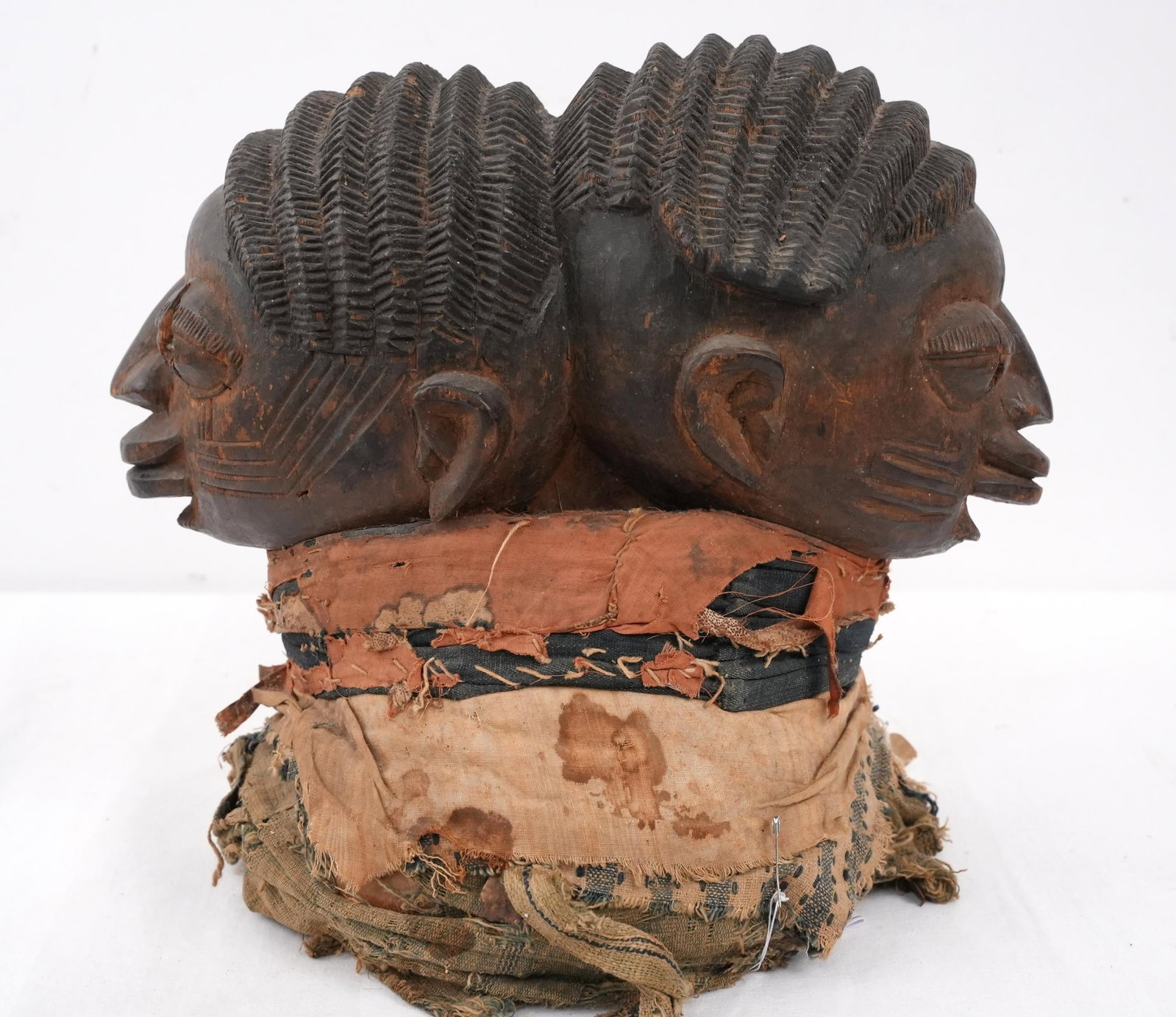 Egba People, Nigeria Janus 2 - headed dance mask: Egba People, Yoruba sub group, Nigeria two headed mask with headpiece draped with cloth and fiber, shows real use age, probably 1920-30 by 13" x 11" x 7" - acquired 1950-1960 Provenance: Important Mon