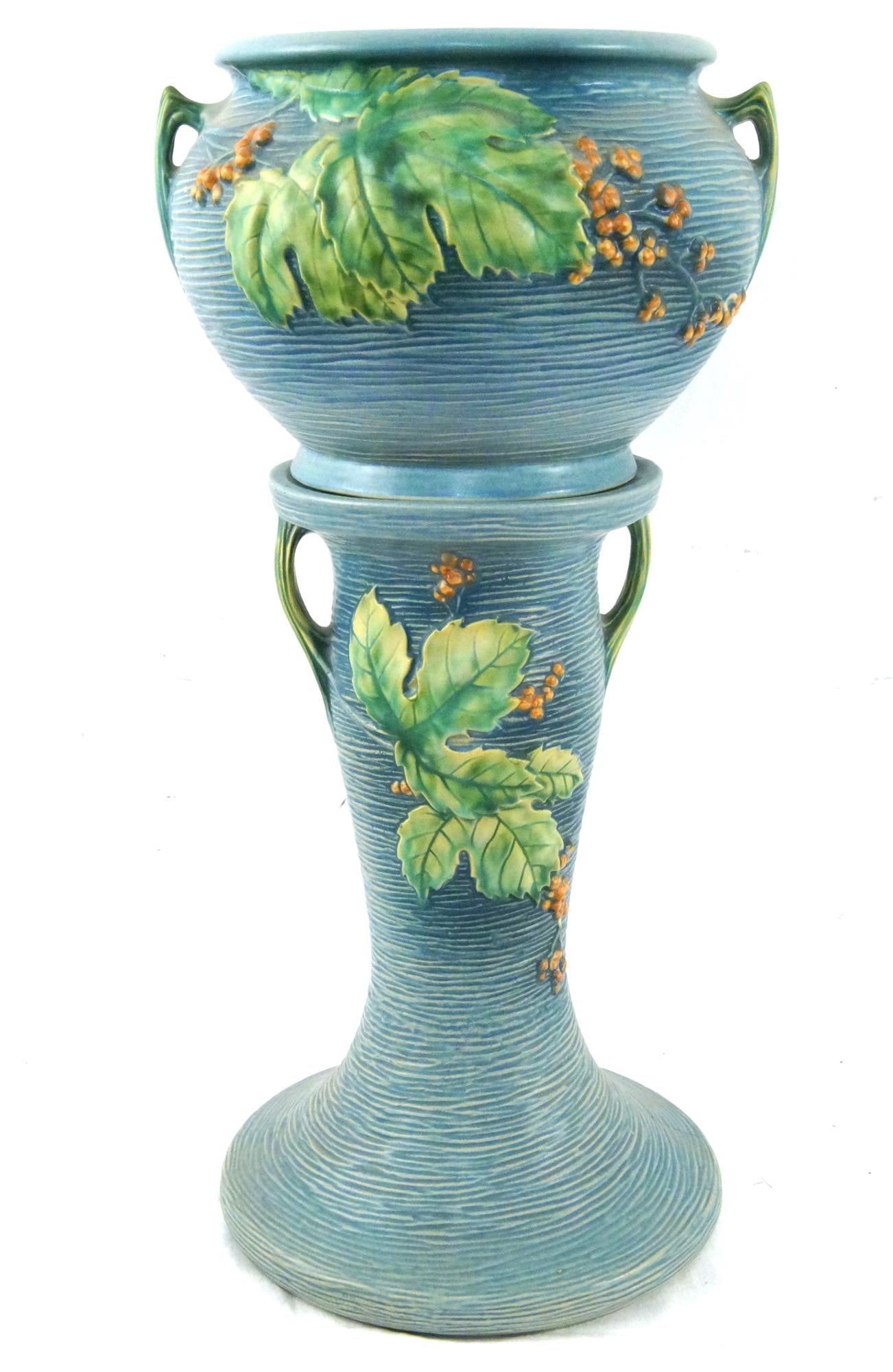 Roseville " Bushberry" jardiniere w pedestal: blue/green measures 24.5" h and 12" diam - Provenance: Barbara Lindgren life time collection