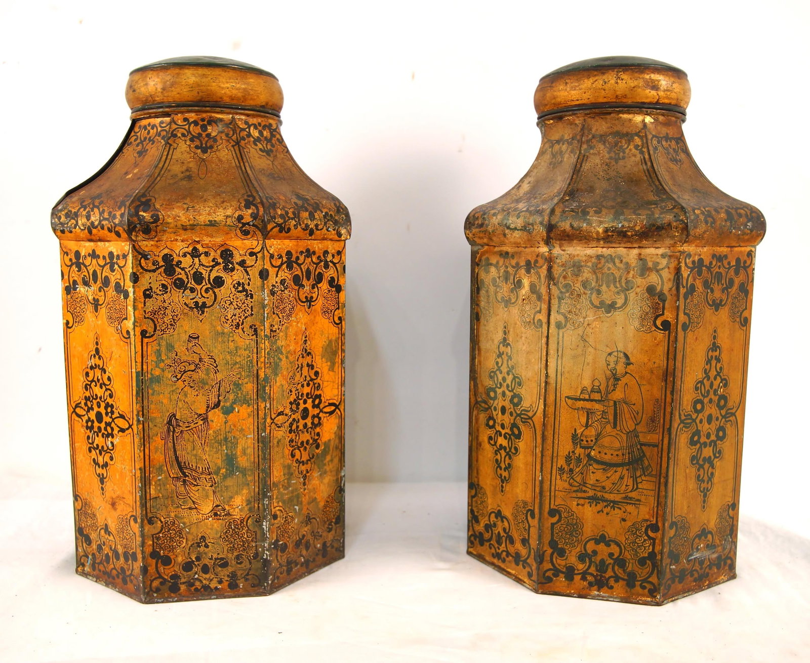 Pair of Antique English Towle Tea tins: lidded tea vessels with painted Chinese Iconography and wreathed scrolls.